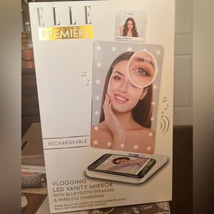 Brand new in box makeup mirror with lights. U can also charge ur phone